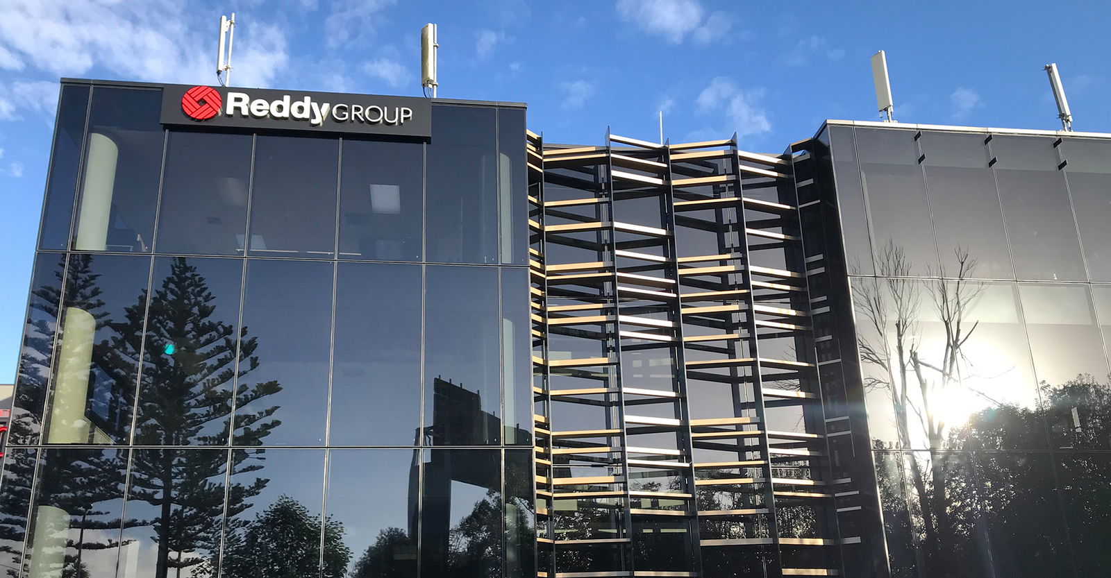 redfire-reddy-group-branding-visual-identity-nz Reddy_group_logo_franchise-marketing_campaign_branding_prodcut_design_digital_marketing_visual_communications_graphic_design_agency_redfire